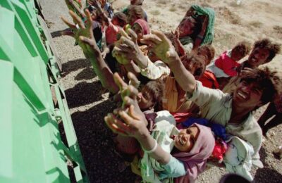 Distributing Food | Earthqucik In Gujrat 2001